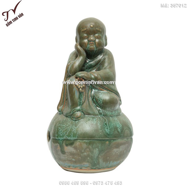Tượng chú tiểu ngồi mõ men xanh cổ cao 35cm - 357012