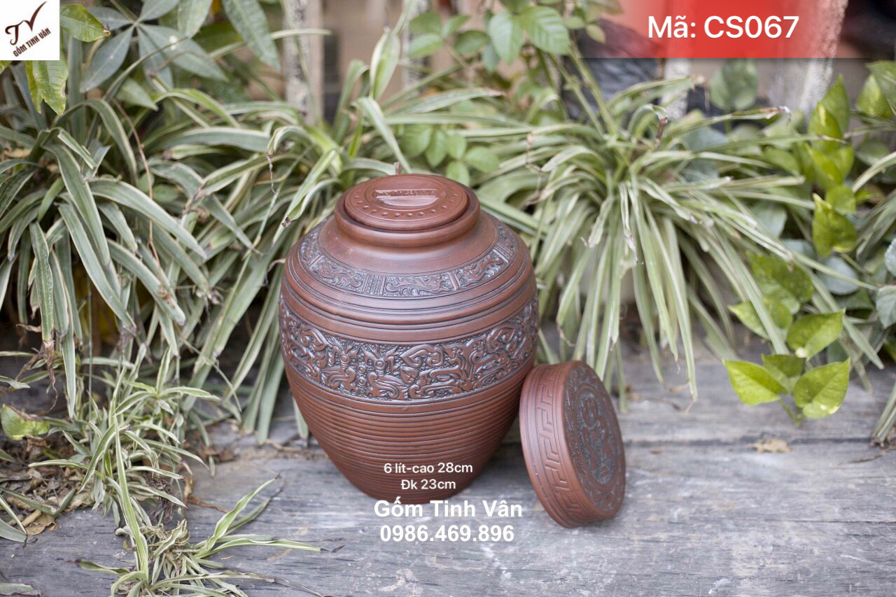 Chum sành trống đồng 6 lit, mã CS076, cao 28-đường kính 23 cm, chum đông sơn âu lạc, hoa văn khắc tay thủ công tinh xảo, 2 nắp kín bình, ngâm rượu ngon, khử độc, bình rượu trống đồng bát tràng