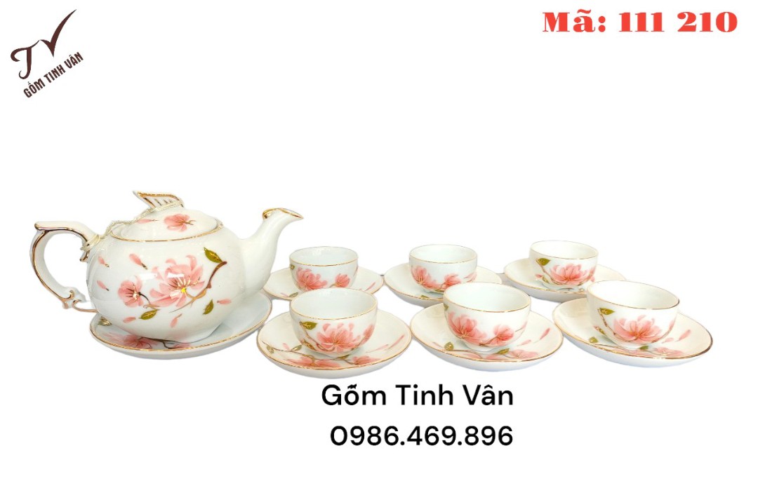 Bộ ấm chén trà,mã 111210,men trắng vẽ vàng 24k,hoa đào hồng nhẹ nhàng,tinh xảo ,dáng ấm tròn, sang trọng,gốm bát tràng,tinh vân