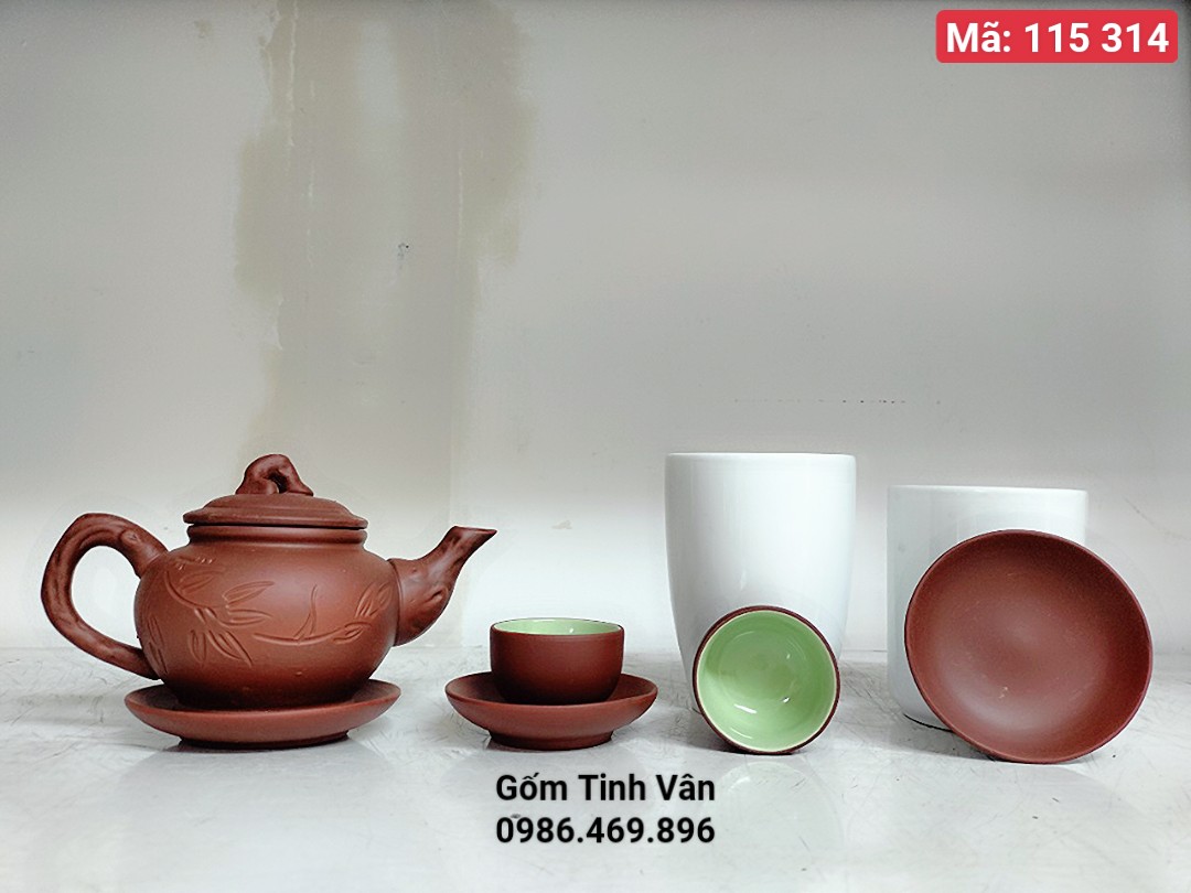Bộ bình trà gốm tử sa nâu, mã 115314 trọn bộ gồm 1 ấm,6 ly, 7 đĩa,hoạ tiết khắc lá trúc,chóp nắp quả đào ,cổ trang,mộc mạc,đậm chất Châu Á,gốm sứ Bát Tràng Tinh Vân