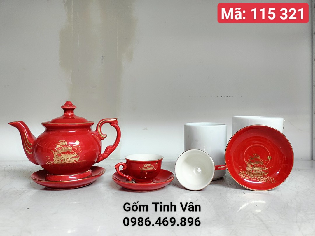Bộ bình trà men đỏ vẽ vàng 24k cao cấp, mã 115321 dáng bình đèn thần quý tộc trọn bộ gồm 1 ấm,6 ly, 7 đĩa,hoạ tiết thuận buồm xuôi gió,phong thuỷ,ý nghĩa,gốm sứ Bát Tràng Tinh Vân