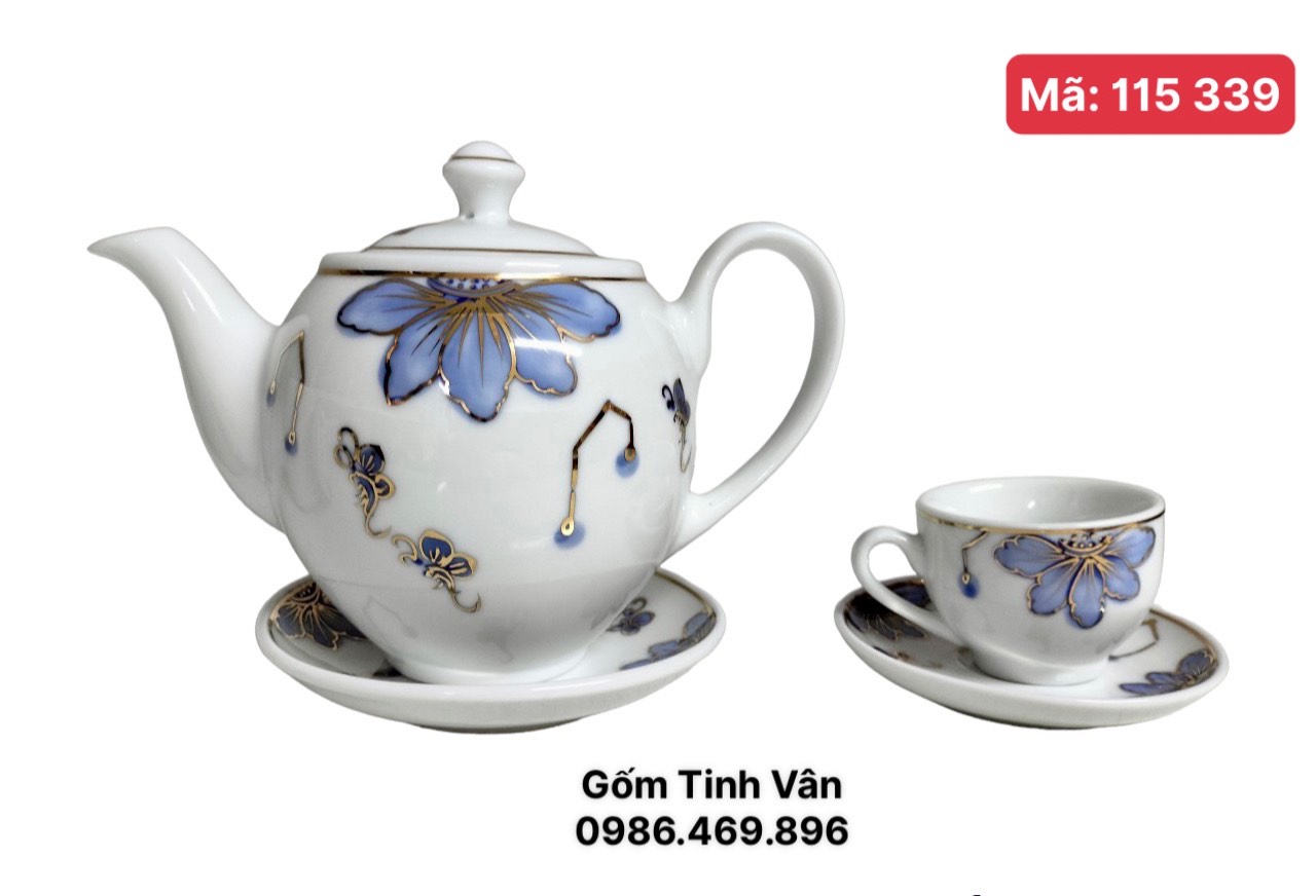 Bộ ấm chén men trắng hoa tím mã 115339, hoạ tiết hoa sen hồng viền bướm vàng 24k, sang trọng, cao cấp, làm quà tặng, trọn bộ gồm 1 ấm,6 ly,7 đĩa gốm Tinh Vân Bát Tràng