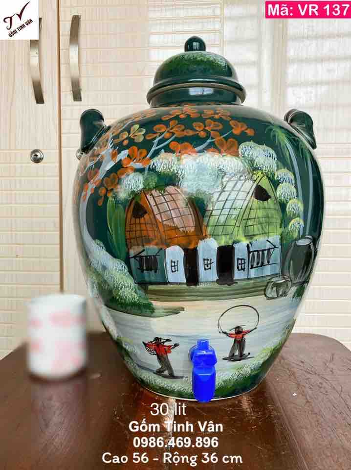 Bình ngâm rượu men xanh lục bảo, có vòi (van) nhựa, mã VR137, hoa văn đồng quê vẽ tay, cao 56, rộng 36 cm, dung tích 30 lit, ngâm rượu ngon, trưng bày đẹp, độ bền cao, sạch sẽ, làm mát rượu, gốm bát tràng cao cấp