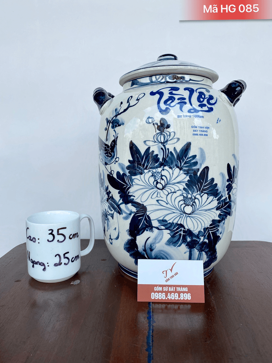 Hũ gạo tài lộc 8kg, mã HG085, men trắng, hoa văn vẽ tay cảnh chim hoa, có 2 tai xách tiện dụng, đựng gạo sạch sẽ, dễ lau chùi, làm mát gạo, giữ độ ngon của gạo, ko mối mọt, gốm bát tràng cao cấp