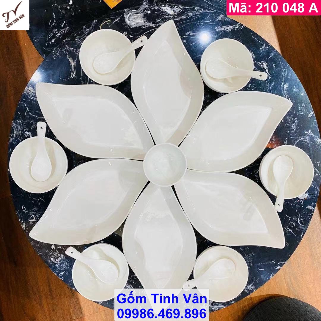 Bộ tô chén đĩa mặt trời gốm sứ men trắng, mã 210048, hình cánh tiên, hình chiếc lá, bộ gồm 6 muỗng, 6 chén cơm, 6 lá, 1 chén chấm, đường kính 45 cm, gốm tinh vân