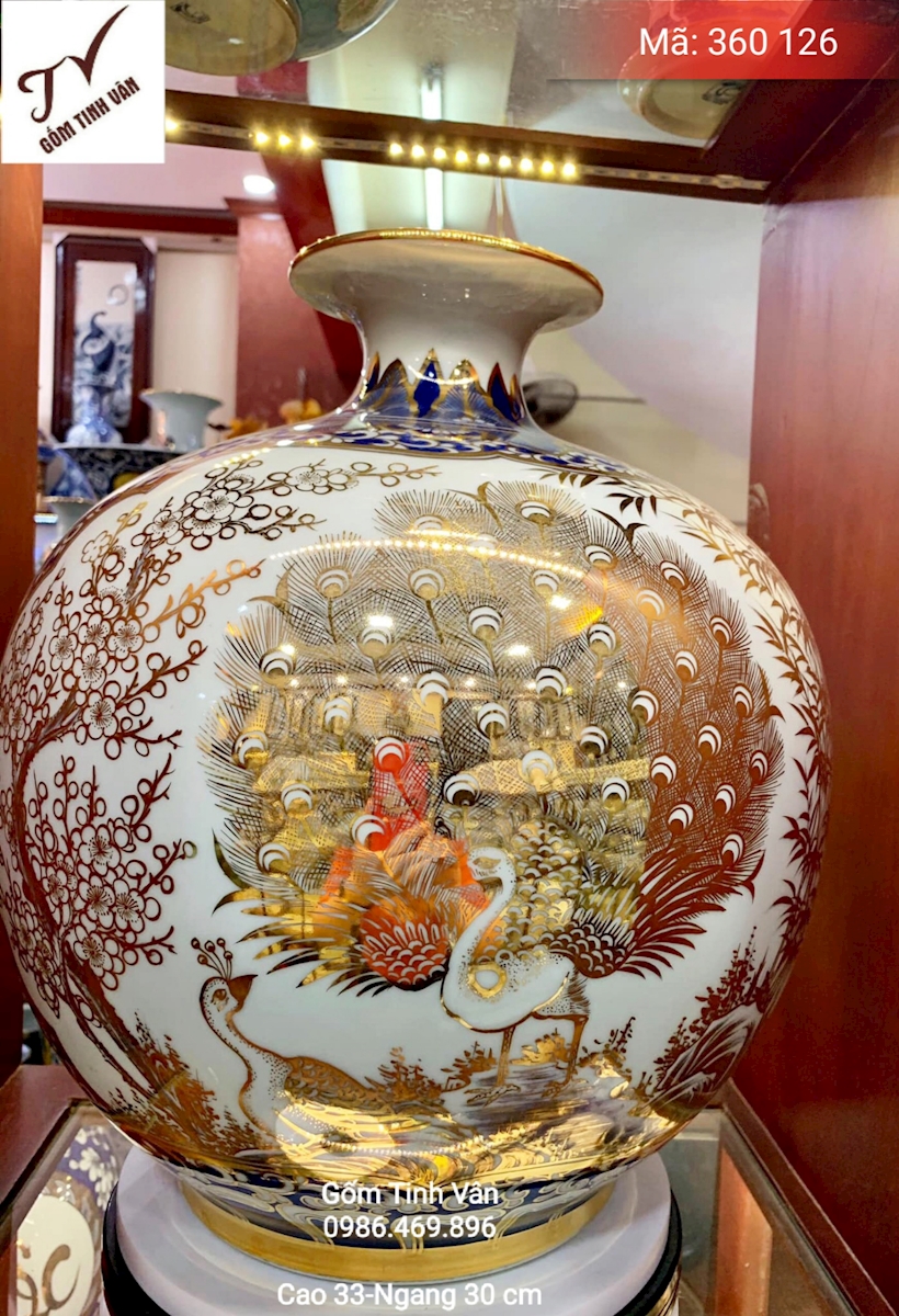 Bình hút tài lộc vẽ vàng 24k, mã 360126, vẽ tay cảnh chim công hoa đào, mùa xuân, đâm chồi nảy lộc, vinh hoa phú quý, men trắng, cao 33 ngang 30 cm, gốm sứ bát tràng, tinh vân cao cấp