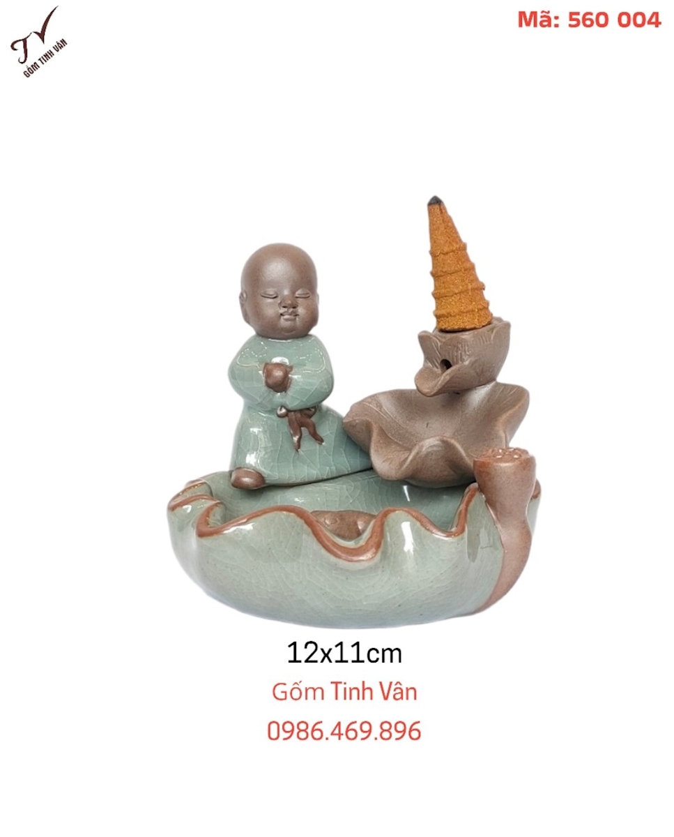 tượng đốt trầm hương, hình chú tiểu ngồi bên lá sen, nhỏ gọn,đẹp,chất liệu làm bằng gốm tử sa kết hợp tráng men,kích thước 12x11cm