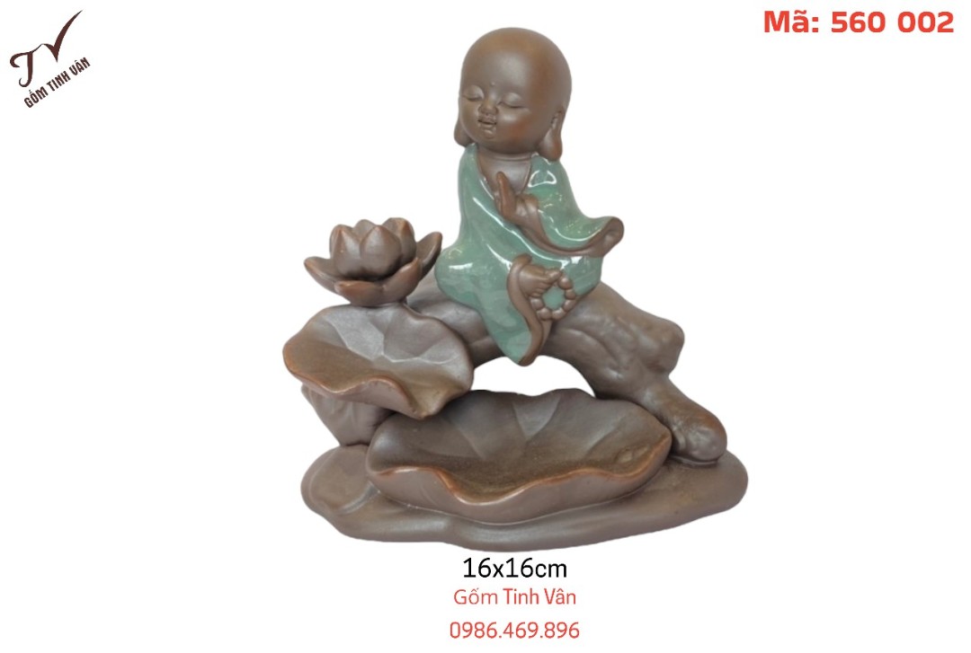 Tượng phật áo xanh ngồi trên cây và lá sen,tượng đốt trầm hương, nhỏ gọn,đẹp,chất liệu làm bằng gốm tử sa kết hợp tráng men,kích thước 16x16cm