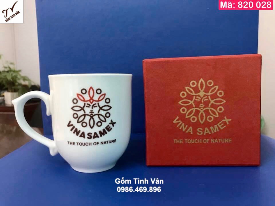 Ly sứ dáng chóp lửa in logo, mã 820028, cao 10 đk 9 cm, dung tích 330ml, hộp đỏ lót lụa vàng, in logo vinasamex, giá báo trên 100 chiếc, cốc sứ quà tặng