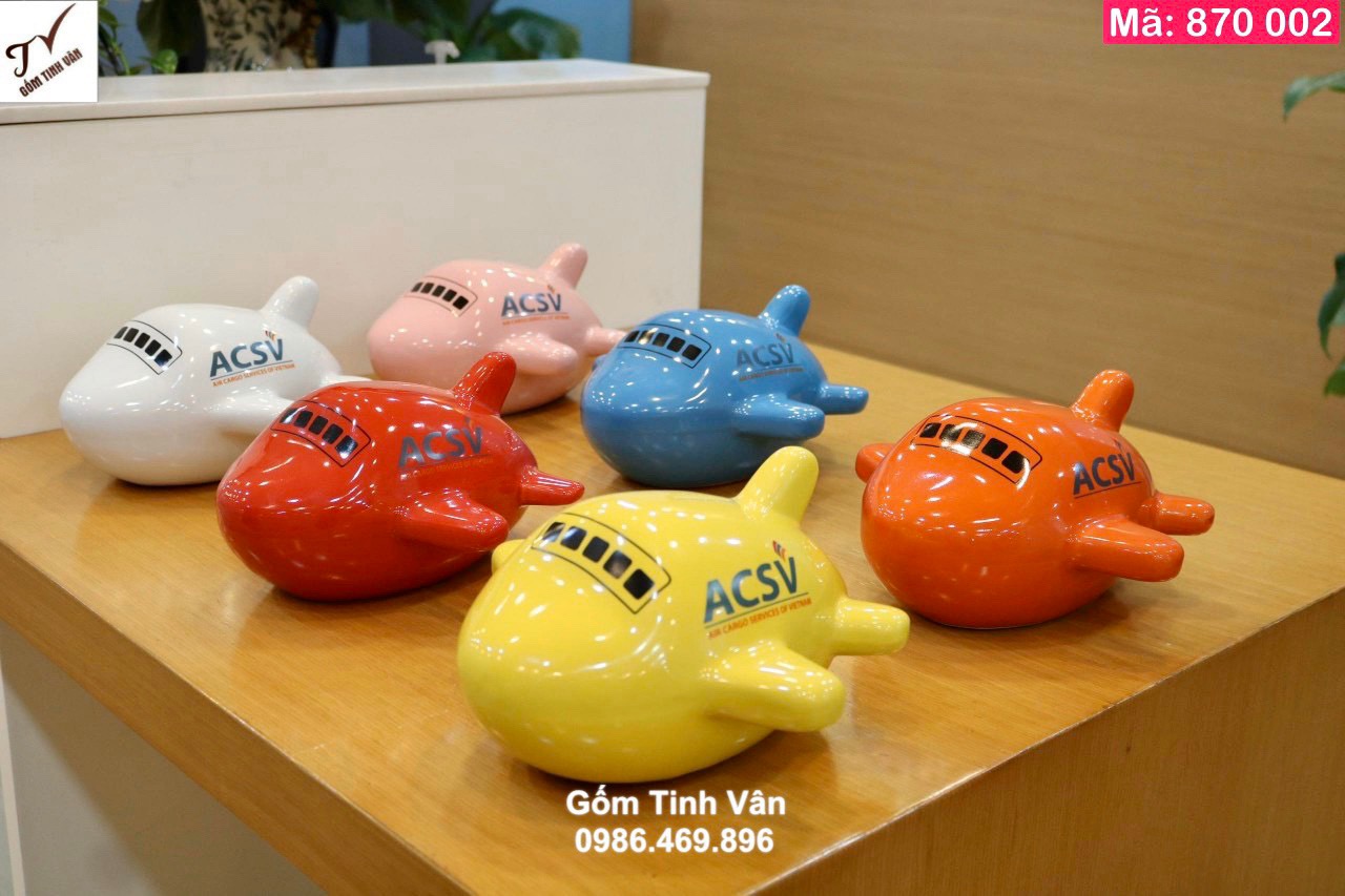 Ống tiết kiệm dáng máy bay, mã 870002, đủ màu sắc, xanh vàng đỏ trắng cam, in logo công ty, quà tặng khách hàng, giá báo trên 100 chiếc
